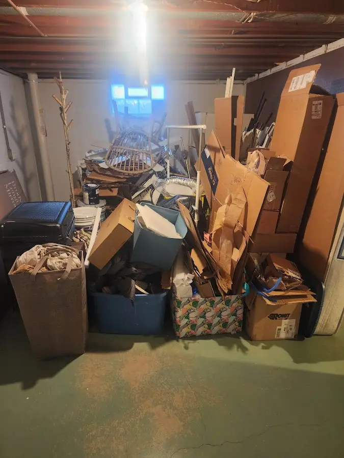 Roll-off dumpster container at job site for 8 Yard Dumpster Rental in Middleton